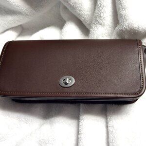 Coach Dinky bag in maple.  Like new